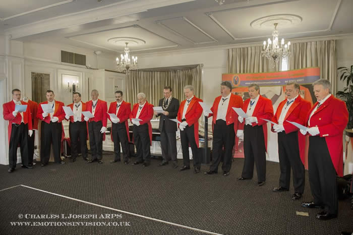 The English Toastmasters Association Choir singing The Mason Song to the Ladies.