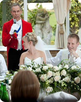 Suffolk Toastmaster Chris Woods with the happy couple